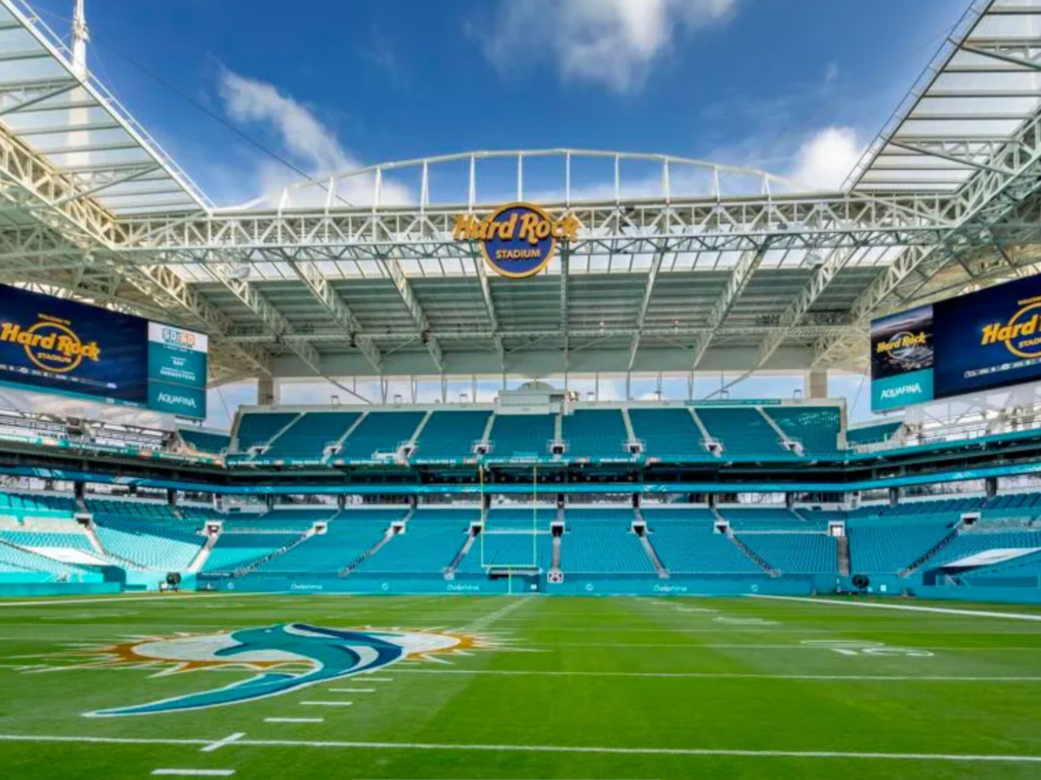 Hard Rock Stadium interior with the Miami Dolphins logo on the field